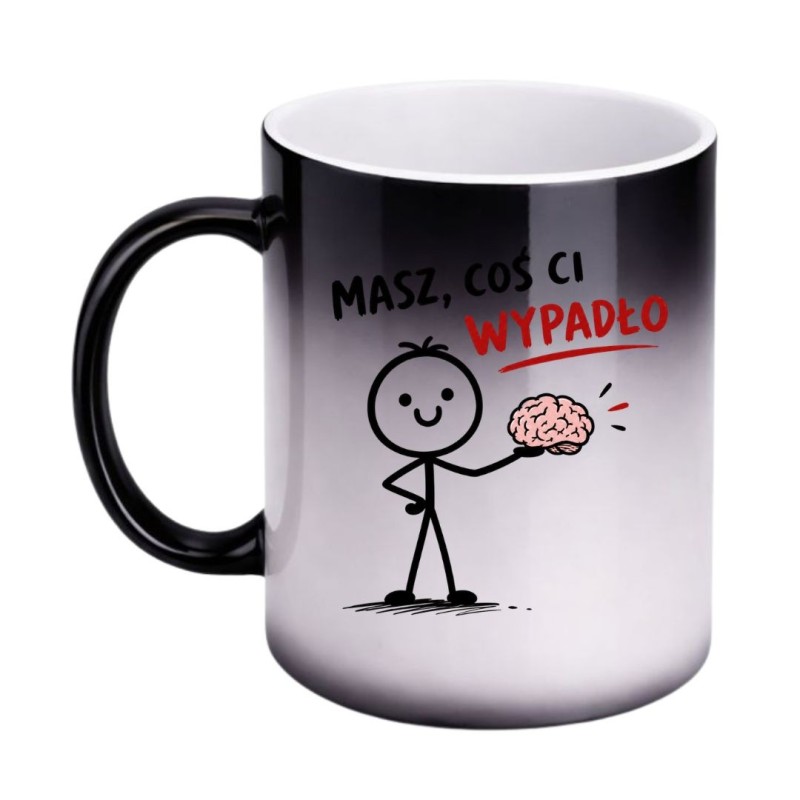 Magiczny kubek „Masz, coś ci wypadło” z zabawnym napisem i minimalistyczną grafiką